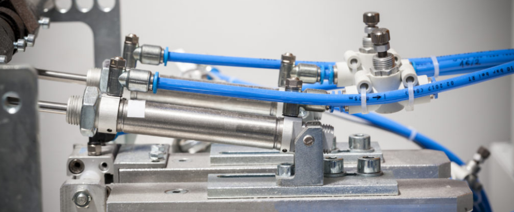 CNC machining center with pneumatic systems