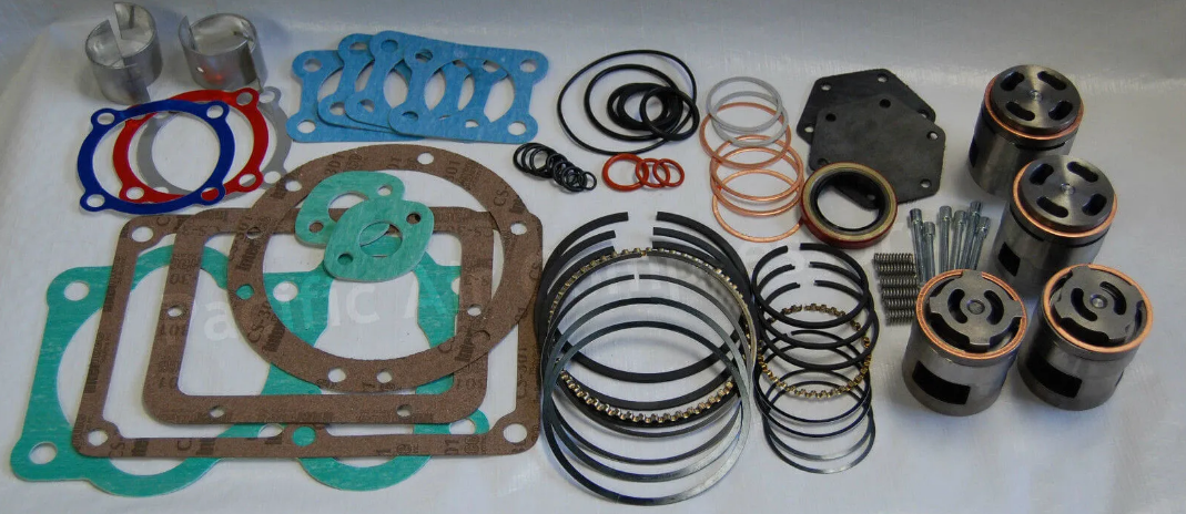 Compressor pump head and valve components