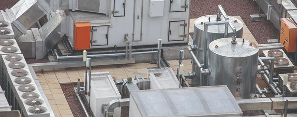 Rooftop chiller installation on a commercial building